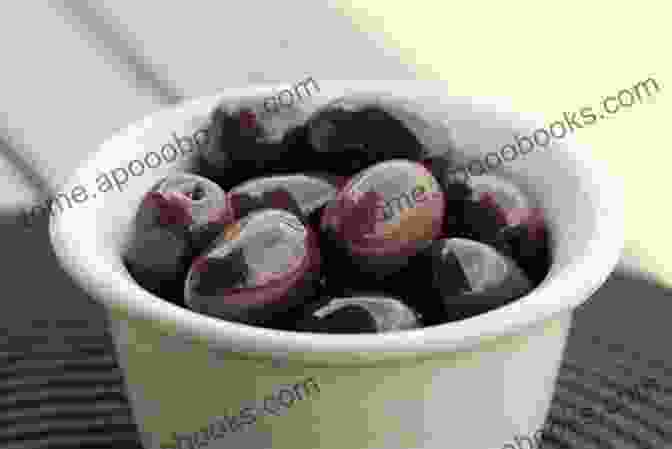 A Bowl Of Kalamata Olives, A Local Delicacy Renowned For Its Exceptional Flavor And Health Benefits KALAMATA CITY GUIDE (SPECIAL EDITION I ENGLISH / GREEK)