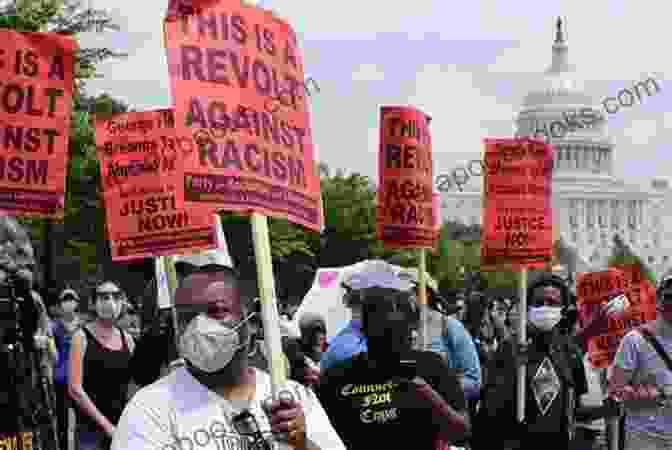 A Group Of Protesters Holding Signs Demanding Justice Written After A Massacre In The Year 2024