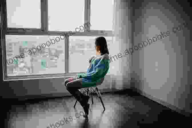 A Young Asian American Woman Sitting Alone In A Dimly Lit Room, Her Expression Pensive Servitors Of Empire: Studies In The Dark Side Of Asian America