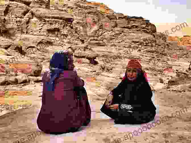 A Young Soldier And A Beautiful Bedouin Woman Embrace In The Desert. A Passion In The Desert