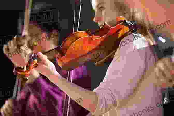 A Young Violinist Performing A Solo Solos For Young Violinists Vol 1