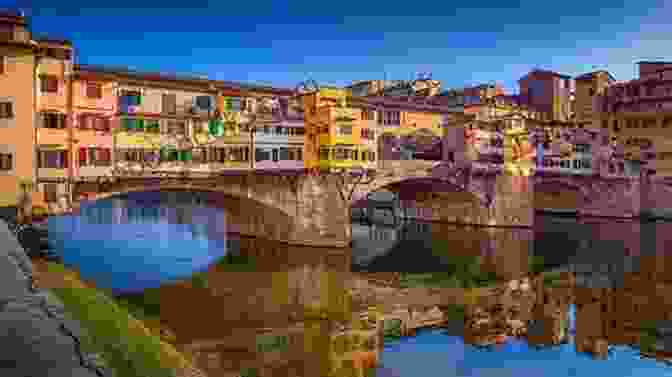 Panoramic View Of Ponte Vecchio, A Medieval Stone Bridge In Florence, Italy, With Shops Lining Both Sides The Ponte Vecchio: The Old Bridge Of Florence