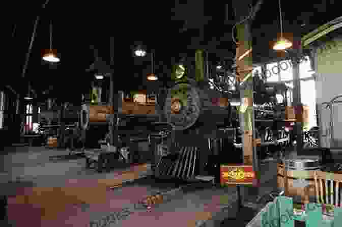 Railroad Workers Repair A Locomotive In A Roundhouse The Railfan Chronicles Detroit Mackinac Railway Volume 1 1975 To 1987